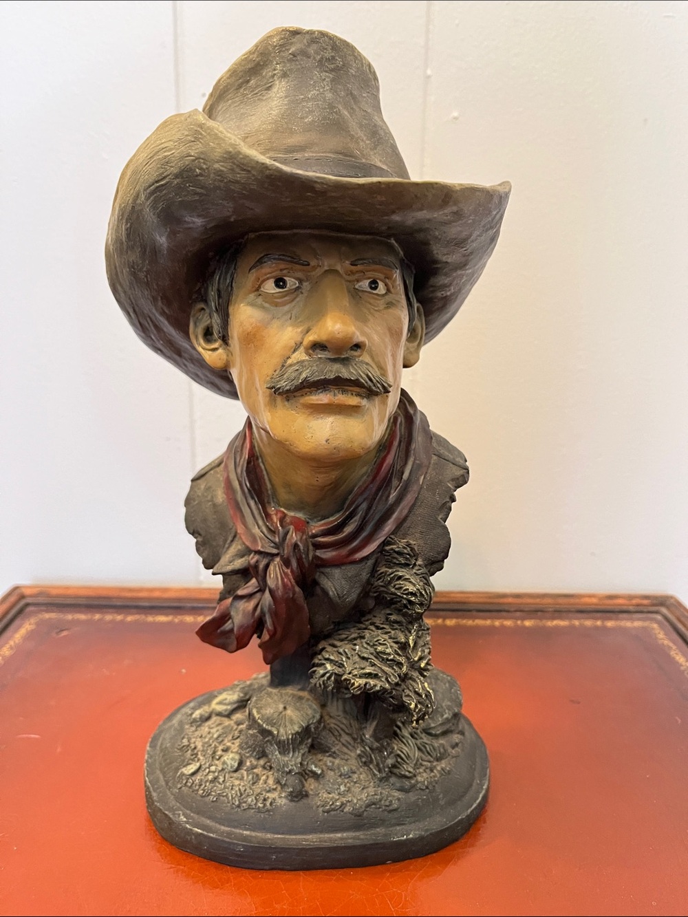 1970s resin cowboy bust features a rugged, western-style hat and  neckerchief